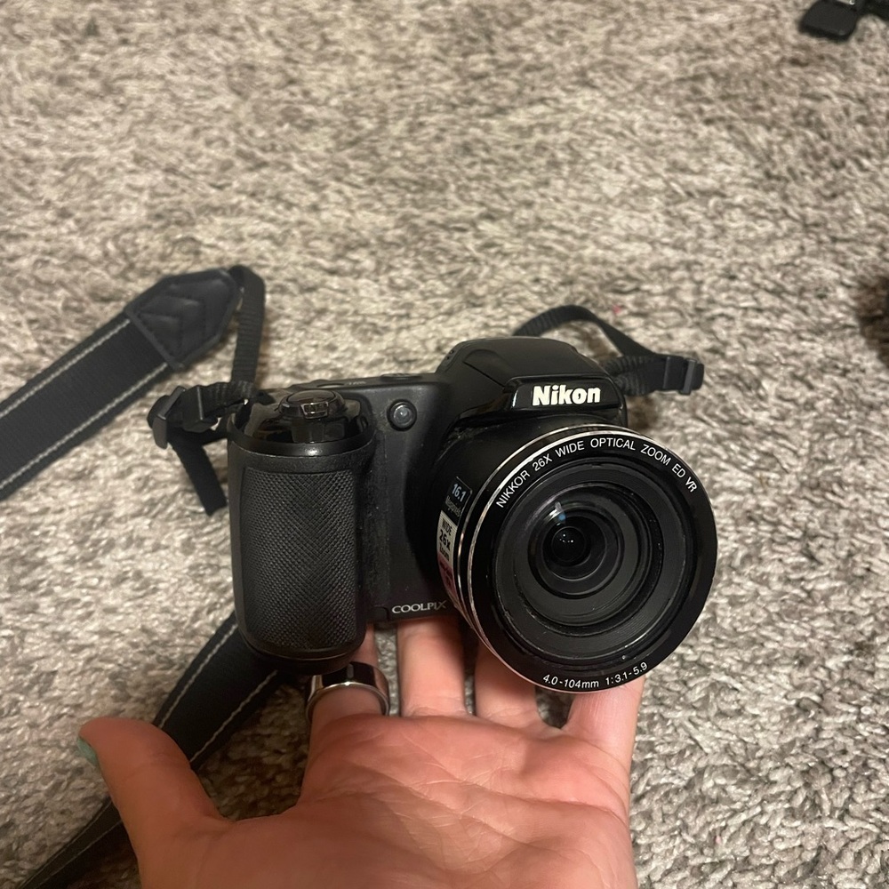 Nikon Black Digital Camera with Strap (DOES NOT TURN ON)